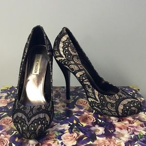 Black satin closed toe pump with lace detail